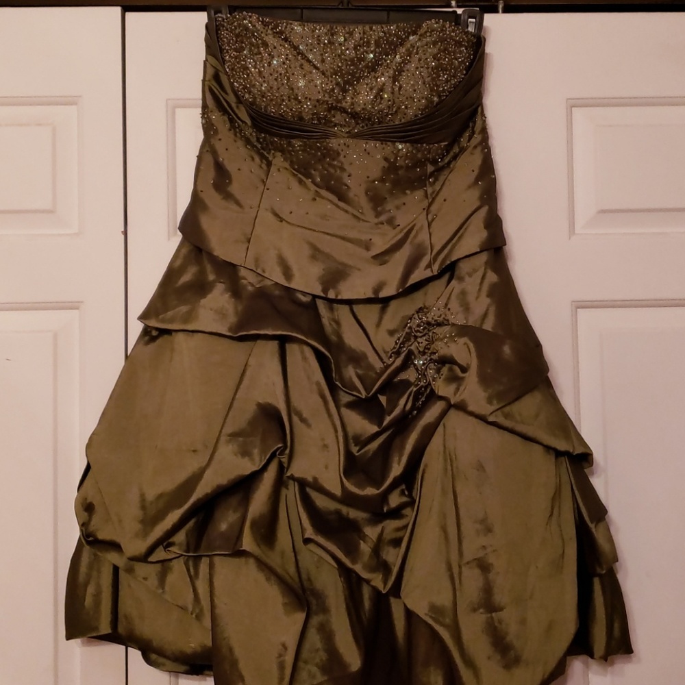 Olive green hand beaded strapless dress.